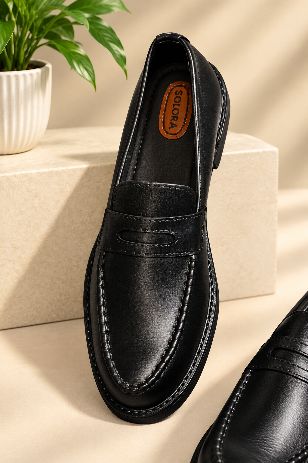 HAND-STITCHED PENNY LOAFERS